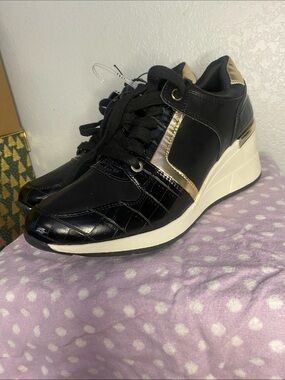 Aldo Black and Gold Wedge Sneakers